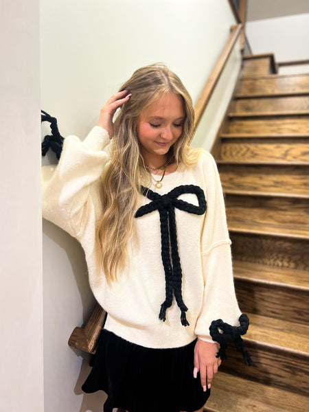 Black Knotted Elegance Ivory Bow Sweater